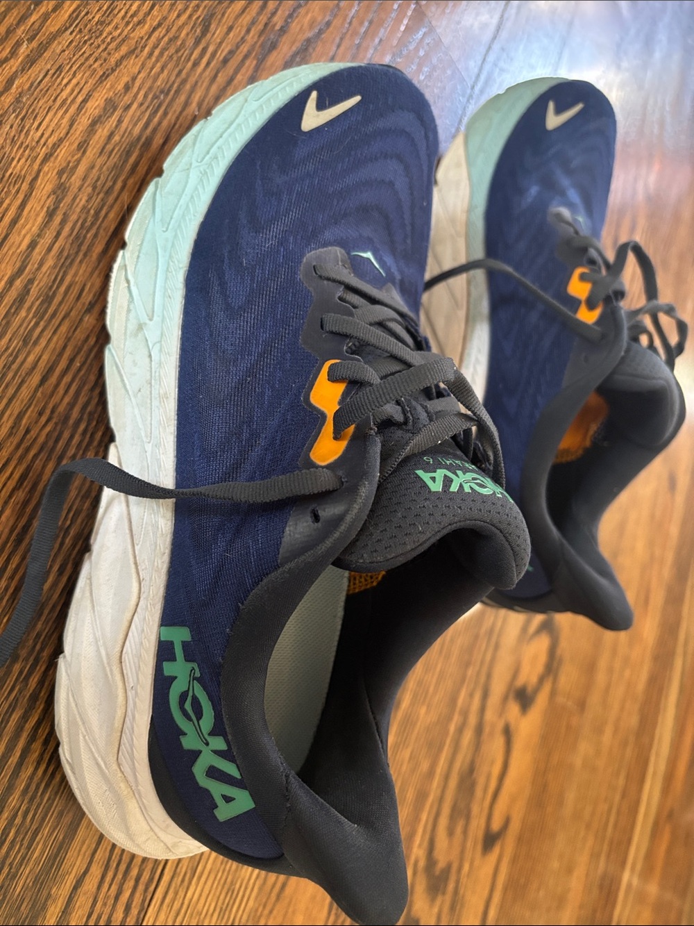 Hoka Navy Athletic Shoes with Mint Midsole and Orange Accents